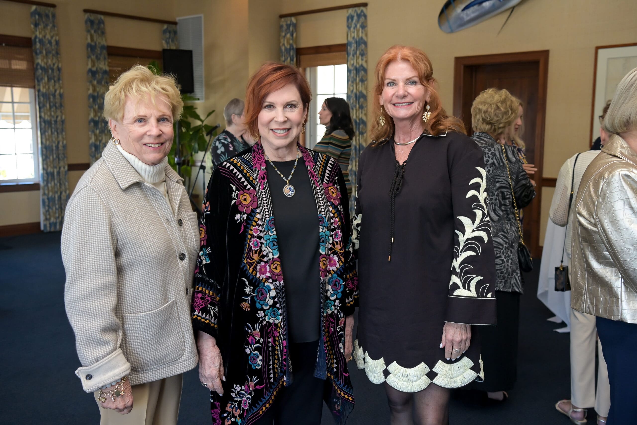 Attendees capturing a moment with Vicki Lawrence at the Living Joyfully event.