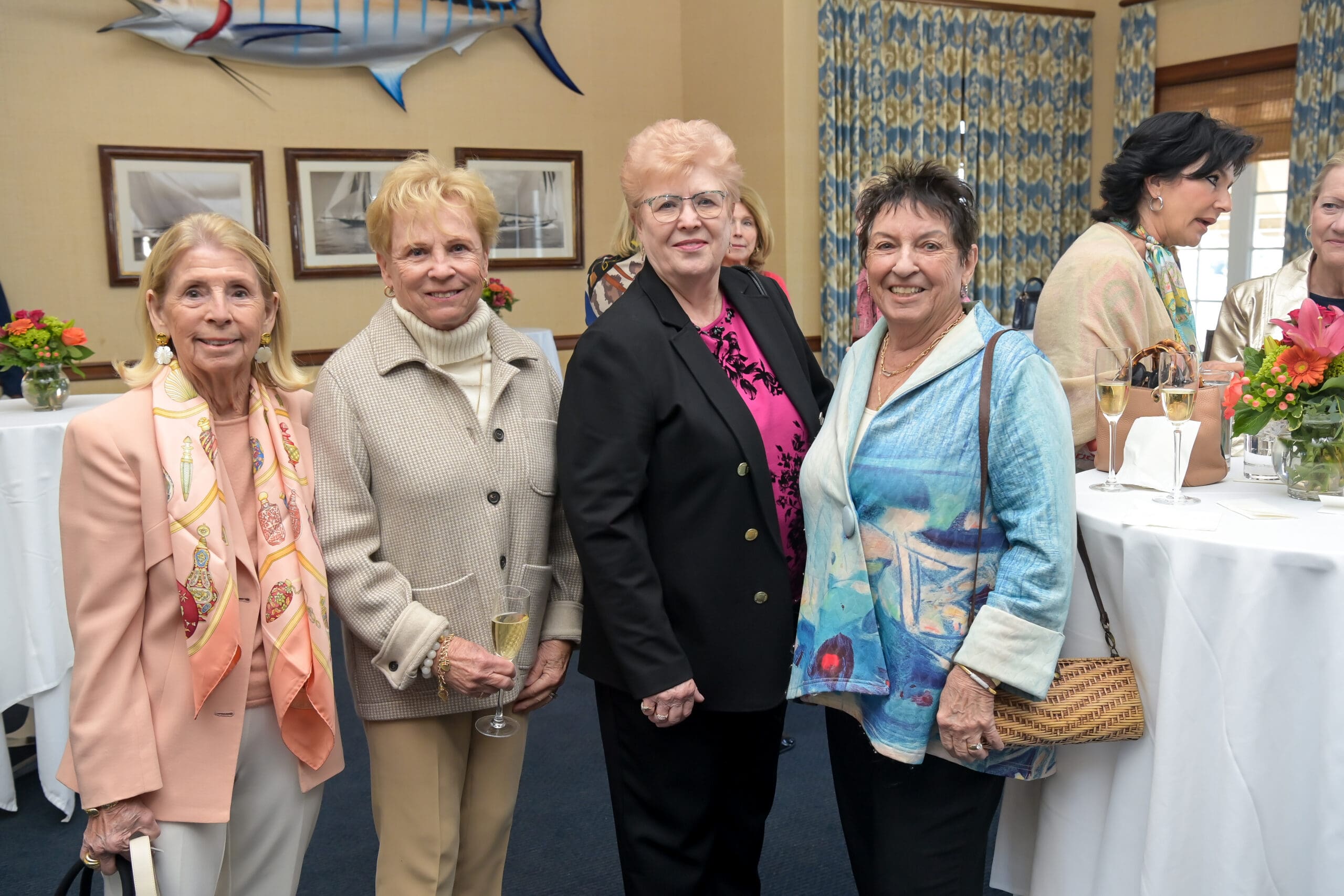 Luncheon attendees gathered for a group photo.