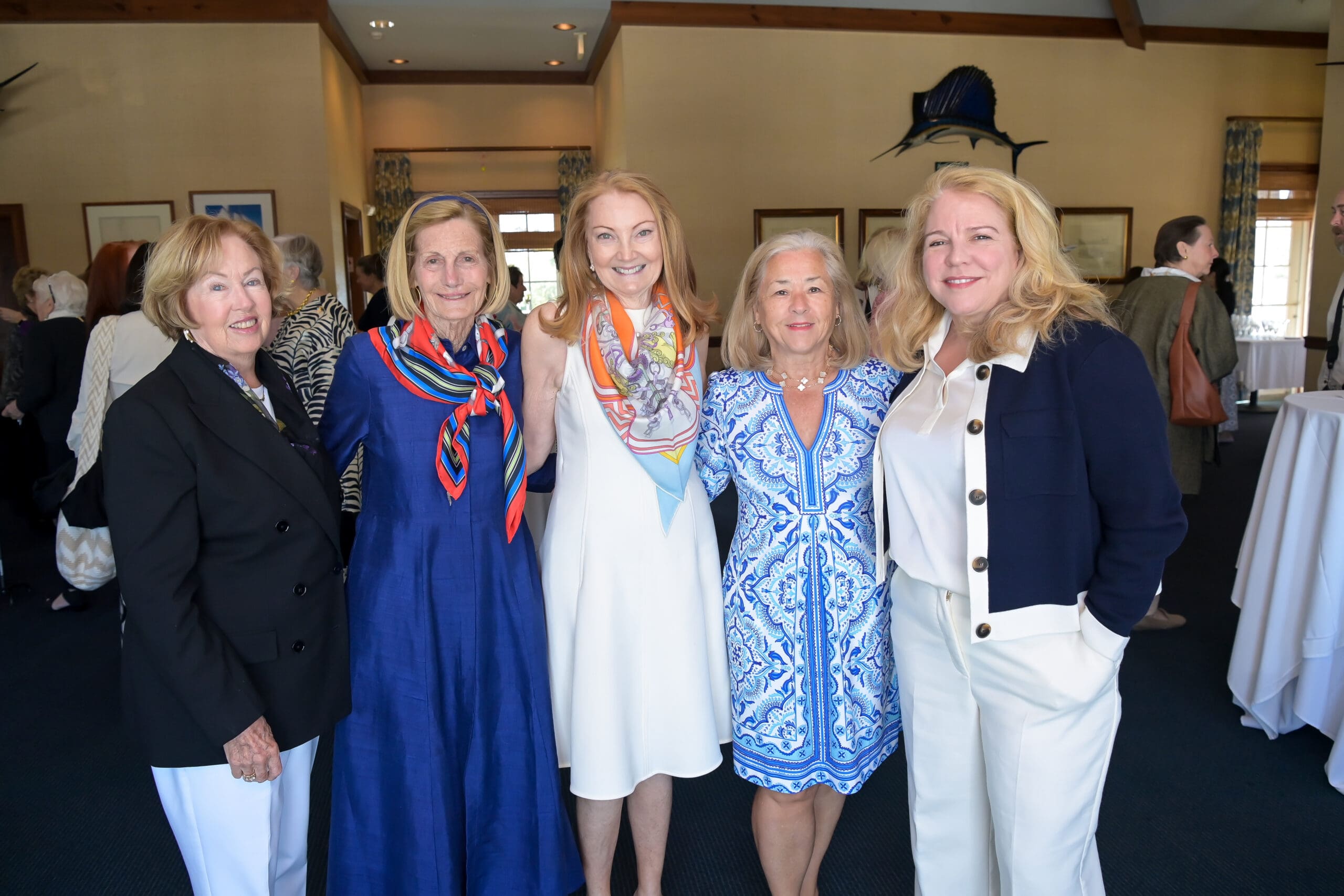 Luncheon attendees gathered for a group photo.