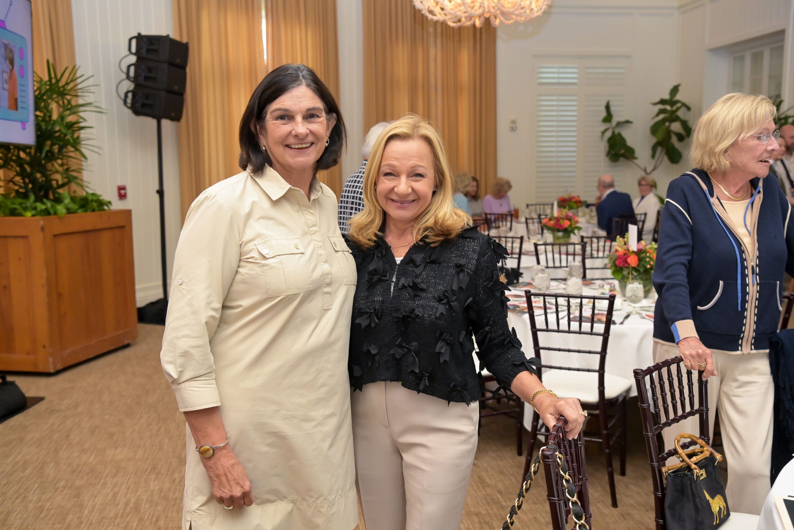 Guests capturing a memory at the Living Joyfully luncheon.