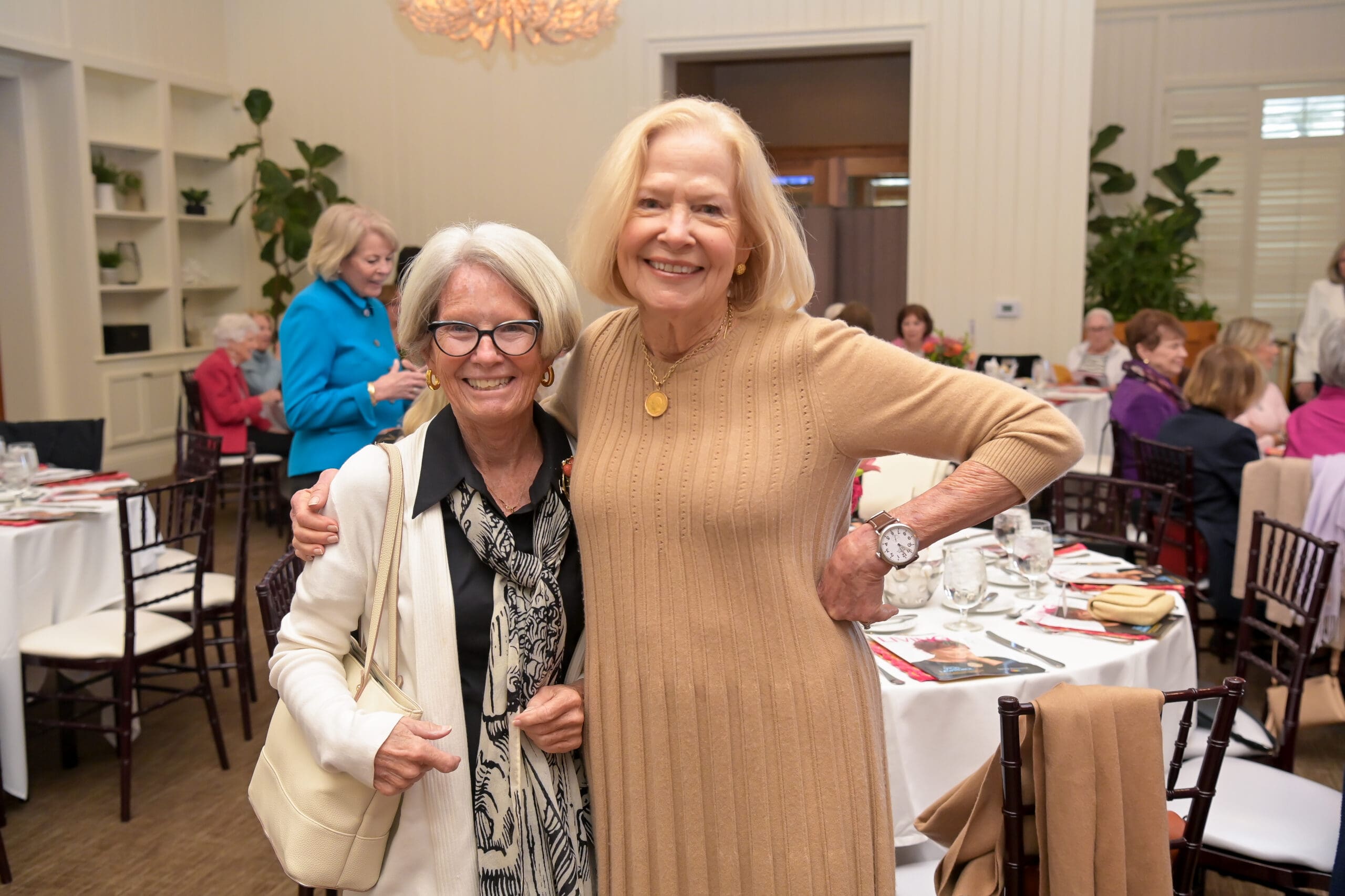 Attendees taking a photo together during the luncheon.