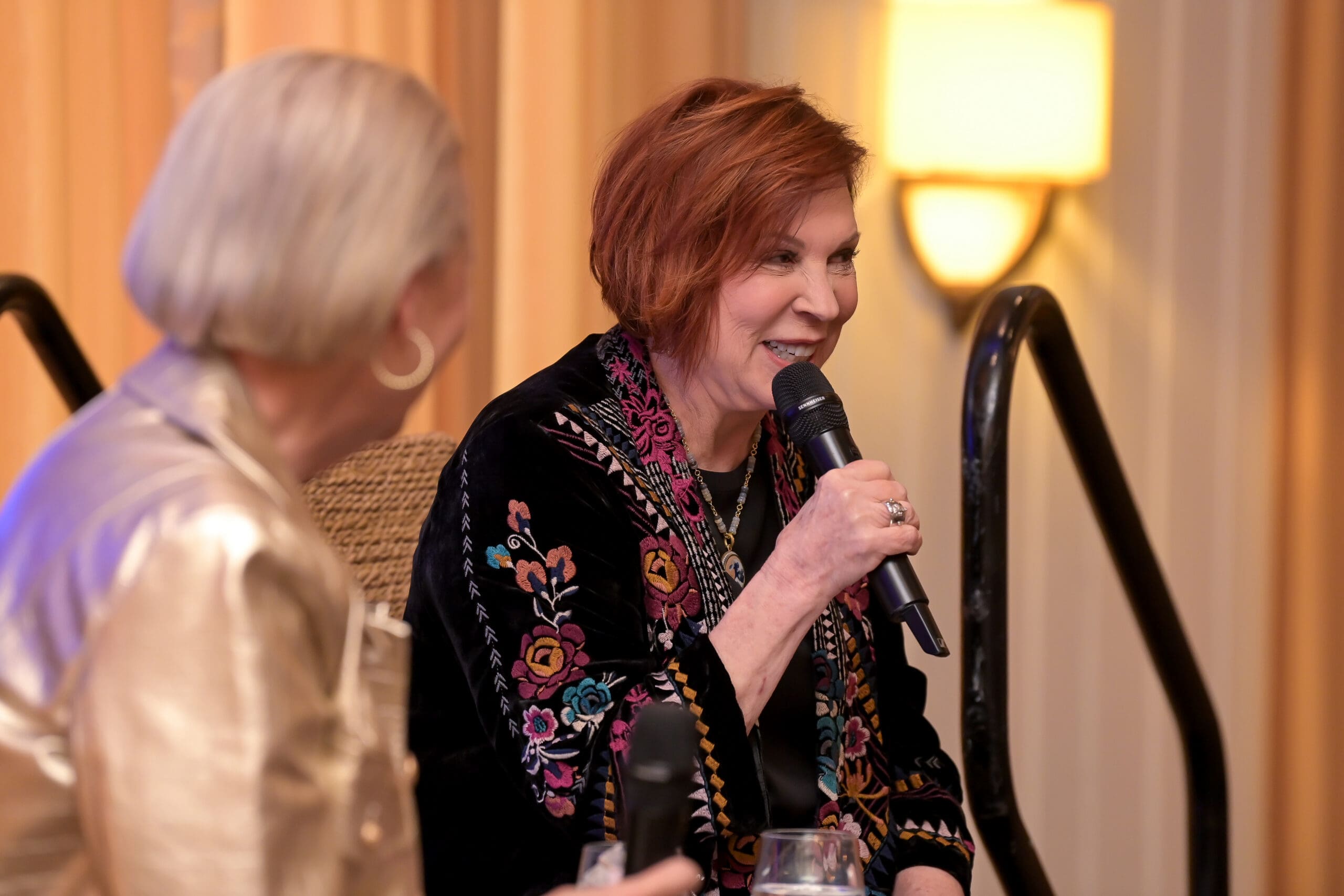 Vicki Lawrence engaging the crowd with her Living Joyfully presentation.