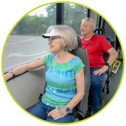 Community Coach Seniors riding on Community Coach bus.